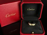 an image of a ring in a red box on a black surface