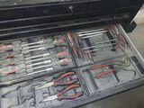 many tools in a tool box that is open
