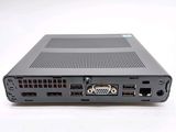 a small black computer with two ports on top of it