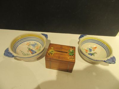 two bowls and a wooden box on a table