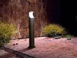 two lights that are lit up in the dark