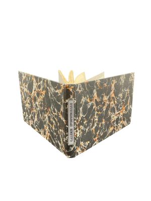 an image of a book with a marbled cover