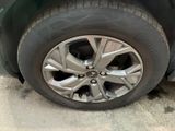 a close up of a tire on a car