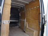 the back of a van with the door open and the back of the van with the door open