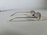 two pairs of glasses sitting on top of a table next to a toothbrush