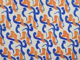 an image of a pattern of orange and blue monkeys on a white background