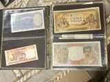 three different types of currency are in a case on a table