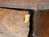 a close up of a piece of wood with a piece of wood sticking out of it