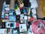 a box full of assorted items sitting on the floor