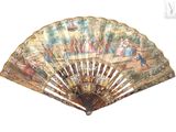 a fan with a painting on it on a white background