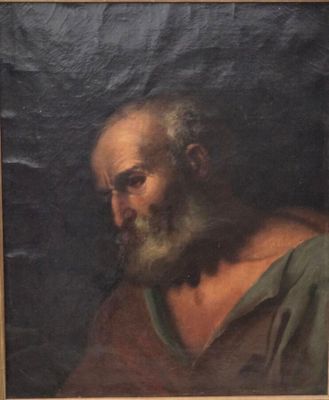 portrait d'un vieil homme barbu portant une chemise verte