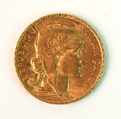 an image of a gold coin with a woman ' s head on it