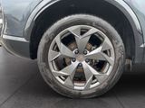 a close up of a tire on a car ' s rim