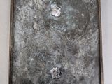a picture of a metal object with a hole in it