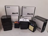 many different types of computer equipment on the table