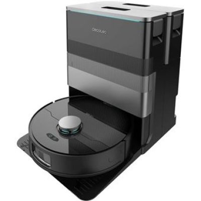 a robotic vacuum cleaner is on top of a black box