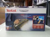 une boîte contenant une brosse à cheveux
