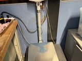 a scale that is sitting on a counter in a kitchen