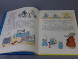 an open book with a picture of an elephant on it