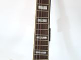an image of a close up of a guitar on a white background