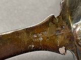 a close up of a piece of metal that has been scratched off