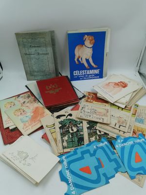 de nombreux livres posés sur la table, avec des images dessus