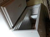 an image of a kitchen with a refrigerator in it
