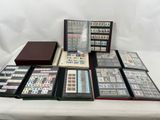 a table topped with lots of different types of stamps