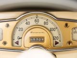 a close up of a car dashboard with a speedometer