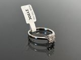 an image of a diamond ring with a price tag on top of it