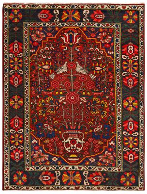 a red and black rug with a floral design on it