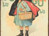 Panneau français représentant une boîte à biscuits, avec un petit garçon tenant un panier de biscuits