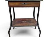 an old wooden table with a drawer on top of it