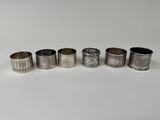 six silver napkin rings