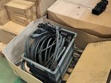 a box with a bunch of wires in it on the floor