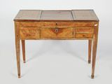 an old wooden table with two drawers and a drawer underneath it