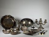 a lot of silver items that are on the table