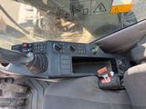 a control panel in the driver ' s seat of a vehicle