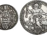une pièce d'argent portant l'image d'un homme