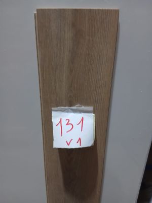 a piece of paper taped to the side of a door