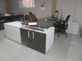 a desk with a bag on it in a room