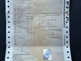 a picture of a receipt with a picture of a person ' s name on it