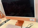 a computer on a desk with a keyboard and mouse