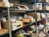 many boxes and boxes on the shelves in the room