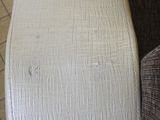 a close up of a mattress on a couch