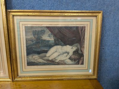 a picture of a naked woman laying on a bed
