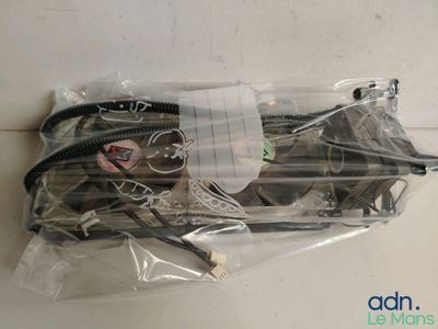 a bag of assorted electronic equipment on a table