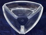 a clear glass bowl on a blue table cloth