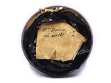 a piece of paper that has been wrapped in a black bag