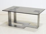 an image of a glass and metal coffee table